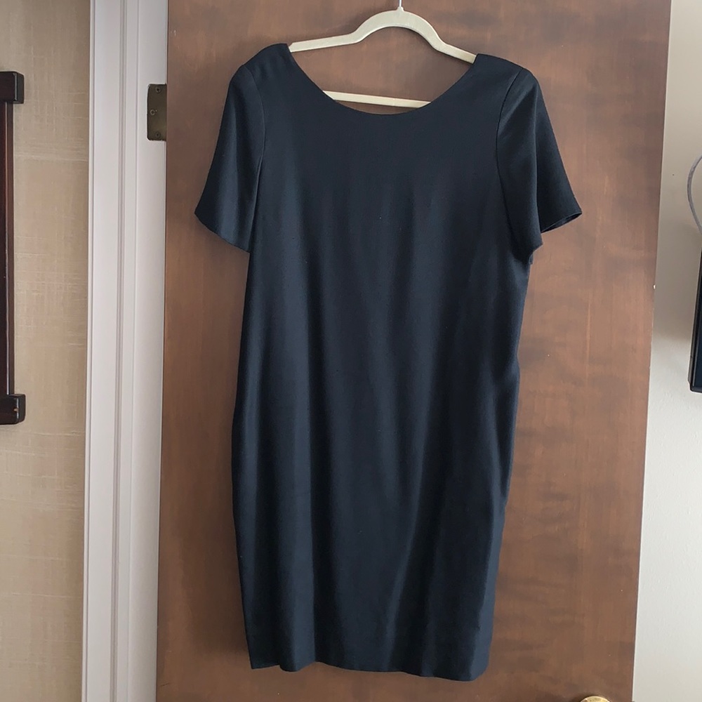 Black shoulder pad dress